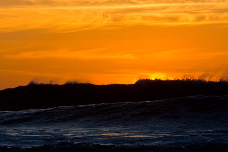 Sun Setting Behind Waves